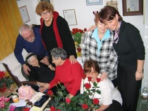 Irena (in black) with some of the people she had saved as children (2005)