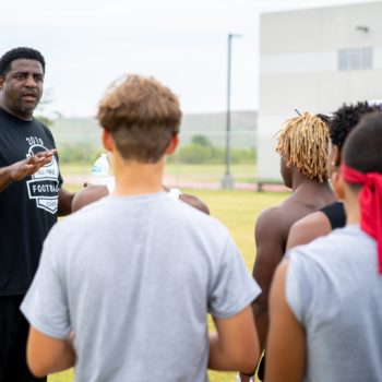 Greg Ellis, Byron Williams and Other Former NFL Stars Train with Youth Athletes at Lewisville Football Camp
